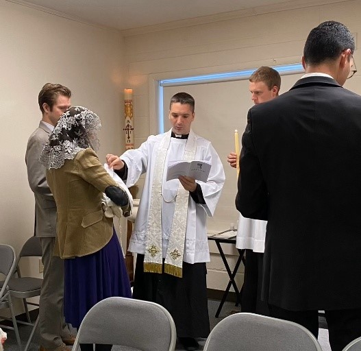 Fr. Haynos Performing an infant baptism